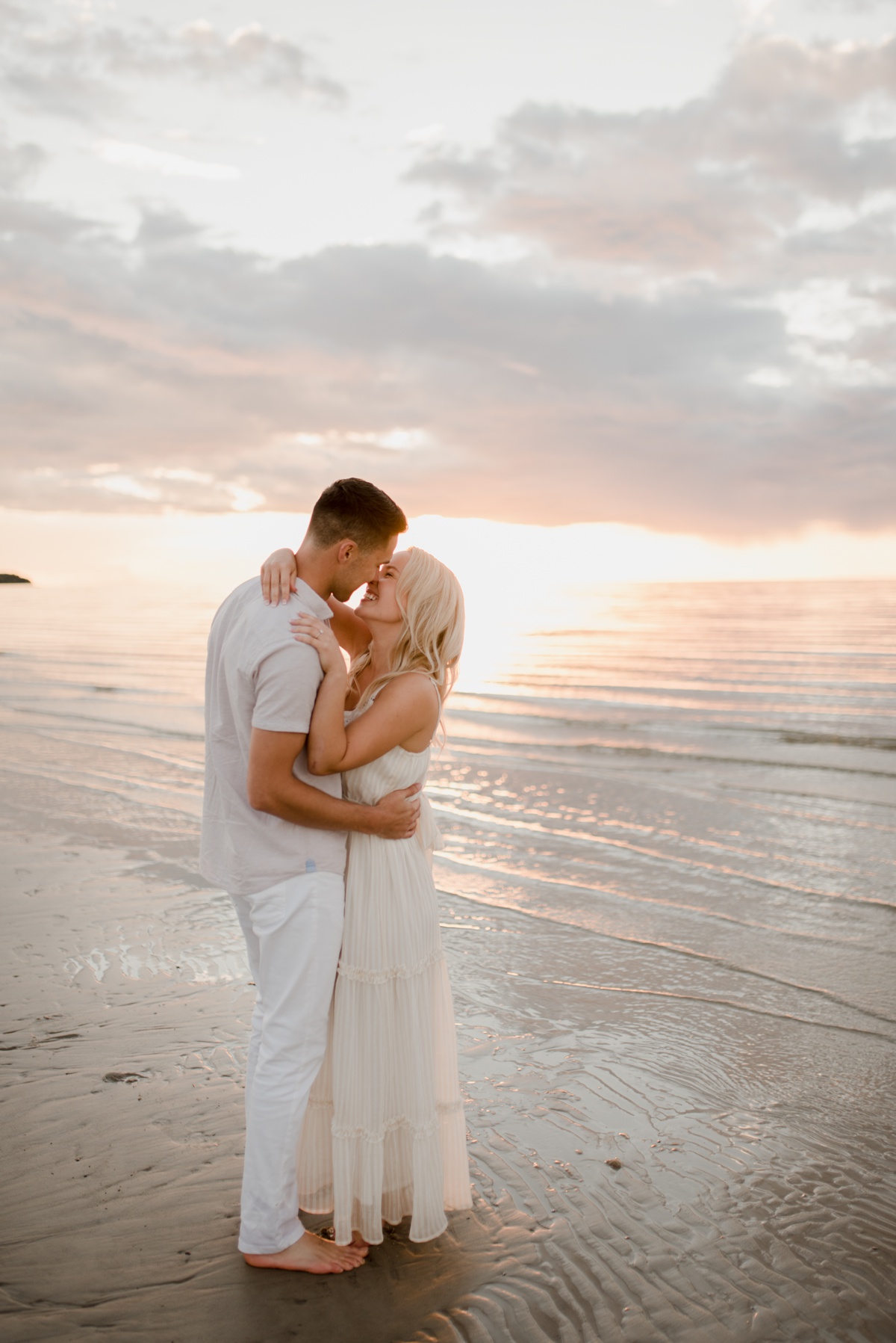 sunset beach engagement session by Vanessa Renae Photography, a Winnipeg and Kenora wedding photographer