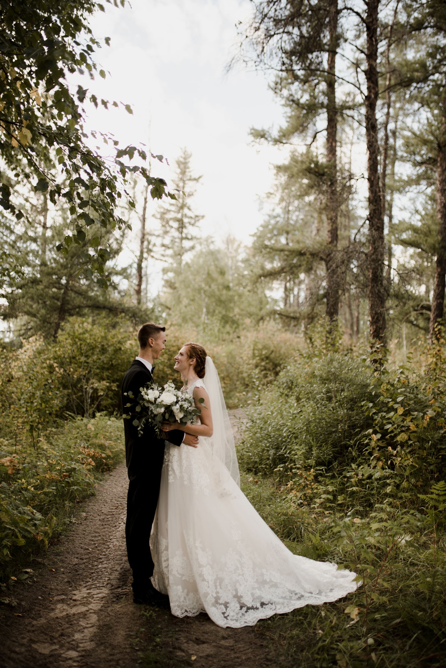 Steinbach church wedding, bride and groom portraits in Sandilands Manitoba. Photographed by Vanessa Renae Photography, a winnipeg wedding photographer and Canadian elopement photographer