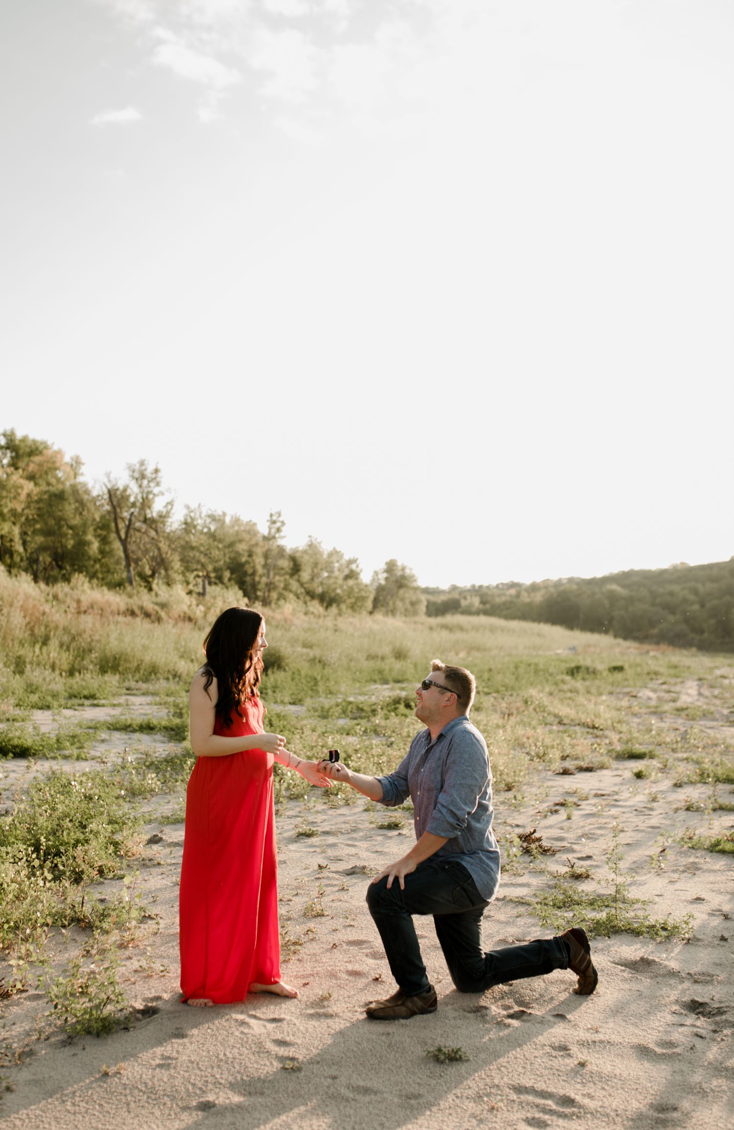Manitoba maternity session & proposal, photographed by Vanessa Renae, a winnipeg wedding and elopement photographer. Jeff gets down on one knee to propose to Ali during their maternity session!