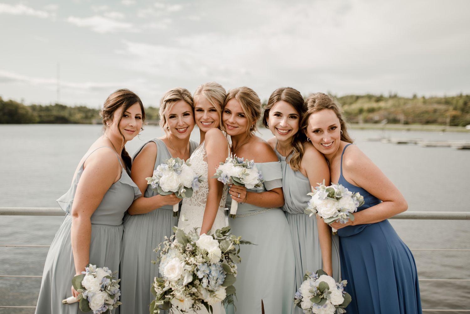 Lakeside Kenora wedding, blue mix and match bridesmaids, fall wedding in Ontario, photographed by Vanessa Renae Photography, a Winnipeg and Kenora wedding photographer