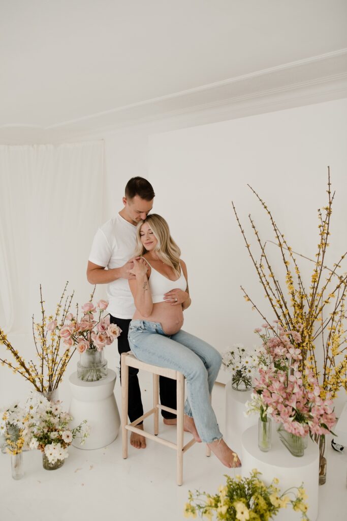 White Studio maternity session with florals by Vanessa Renae Photography, Winnipeg studio maternity session