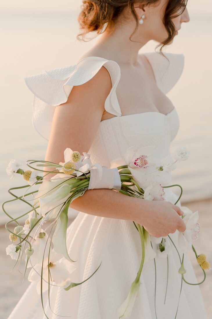 best Winnipeg elopement photographer - grand beach elopement - Vanessa Renae Photography - Winnipeg anniversary session - Alena Leena dress - beach bridal session
